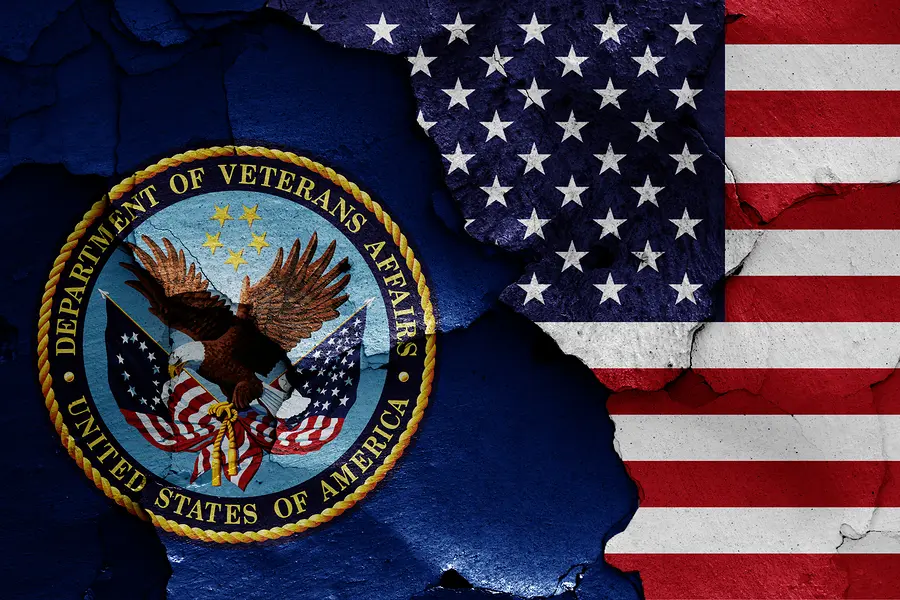 flags-of-department-of-veterans-affairs-and-usa-painted-on-cracked-wall